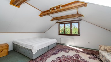 Malebný dům s příjemnou zahradou v atraktivní lokalitě.