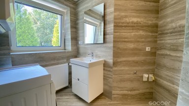 Příjemný dům po celkové modernizaci se zahradou v prestižní lokalitě.