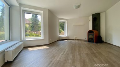 Příjemný dům po celkové modernizaci se zahradou v prestižní lokalitě.