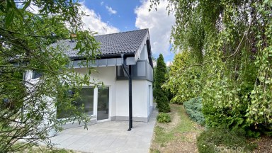 Příjemný dům po celkové modernizaci se zahradou v prestižní lokalitě.