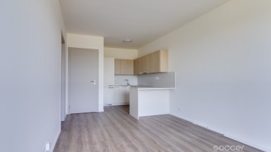Pronájem nového bytu 2+kk s balkonem a garáží na Praze 9.