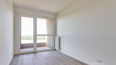 Pronájem nového bytu 2+kk s balkonem a garáží na Praze 9.